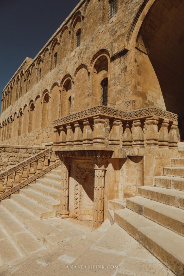 Stone stairs leading to the entrance of the Mardin Grand Mosque.