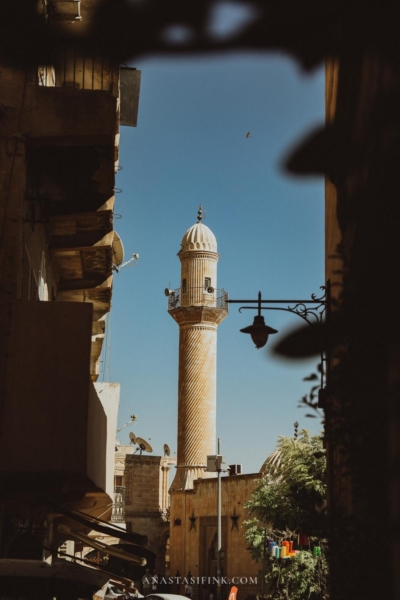 Historic minaret standing tall in Mardin's old town.