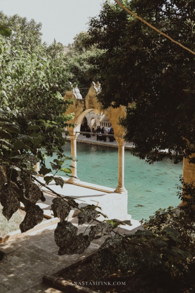 Beautiful archway with a view of the water at Balıklı Göl in Sanliurfa.