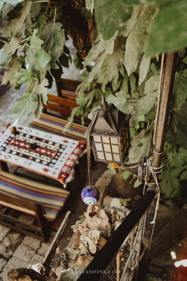 The courtyard area with plants and outdoor furniture.