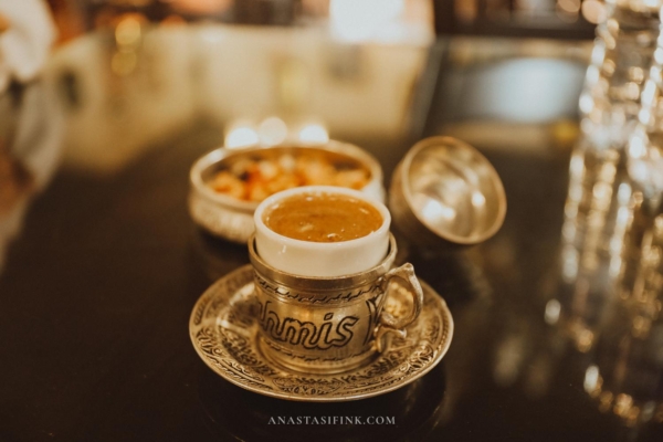 A traditional pistachio coffee served in a cup at Tahmis Kahvesi