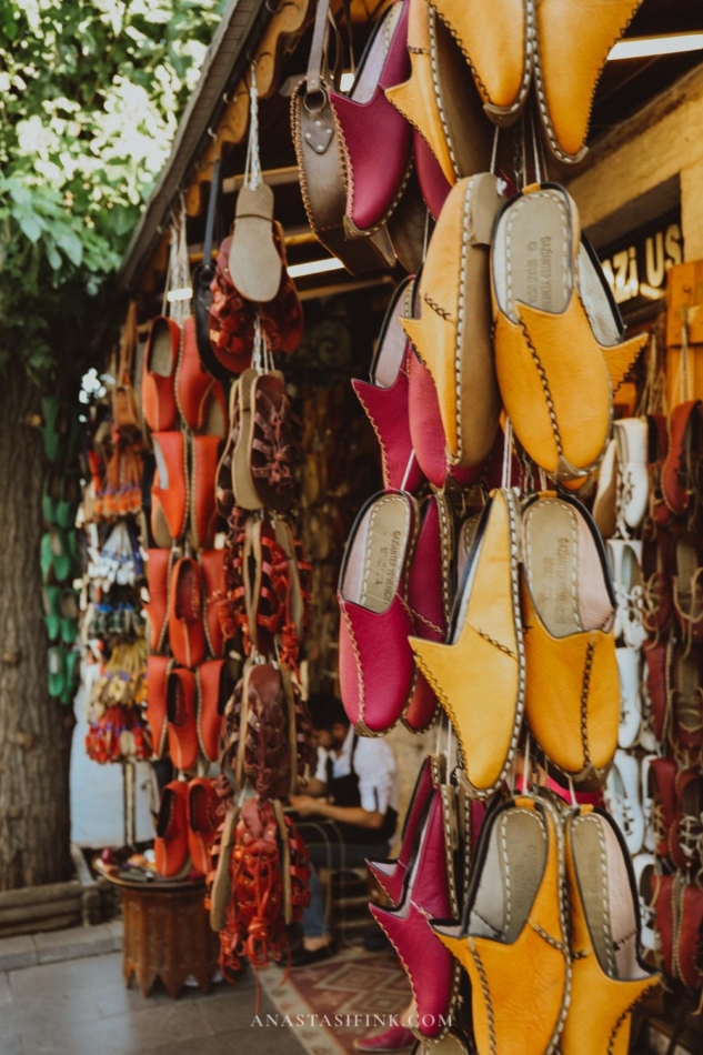 A variety of traditional Yemeni shoes displayed at a market stall in Gaziantep.