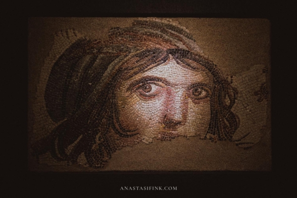 The famous "Gypsy Girl" mosaic in the Zeugma Mosaic Museum, known for its intricate detail and historical significance.