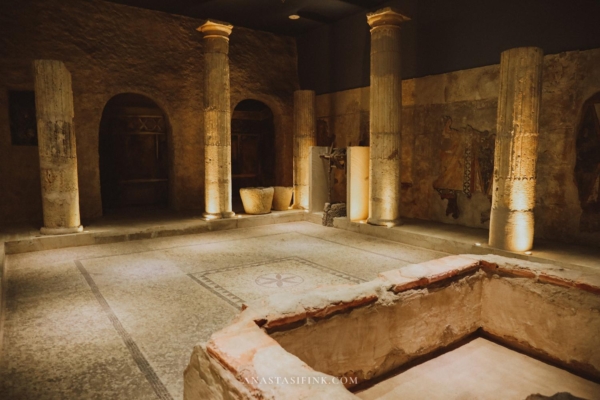 A room within the Zeugma Mosaic Museum showcasing ancient ruins and artifacts.