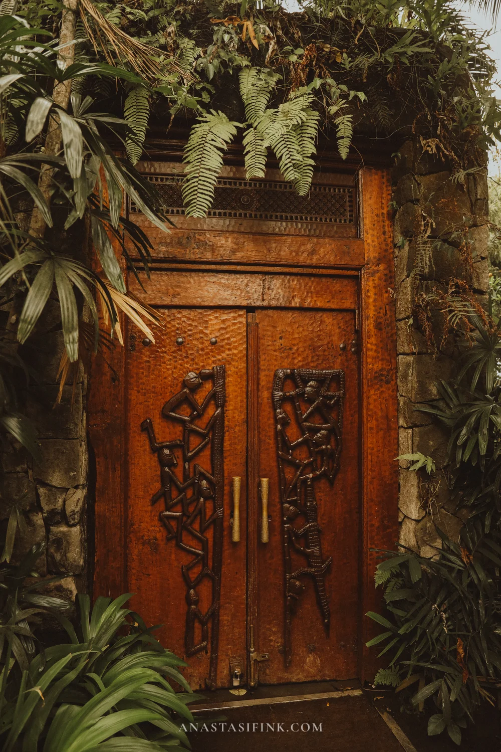 Carved wooden door with birds