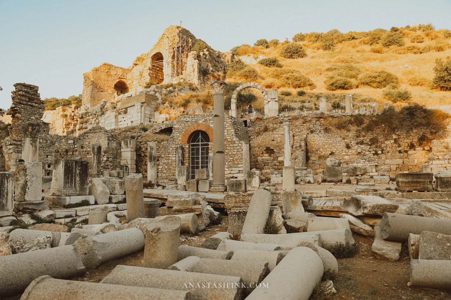 Basilica ruins with brick arches and columns