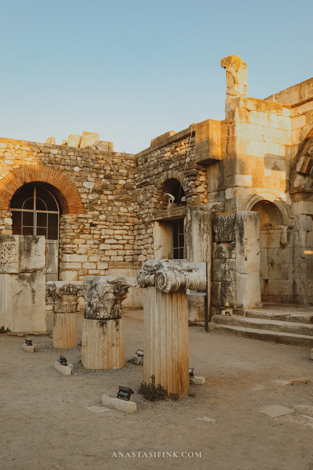 Ruins with Corinthian columns and brick arches
