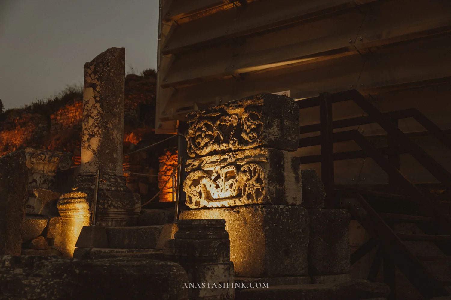 Carved capital in close-up, night illumination