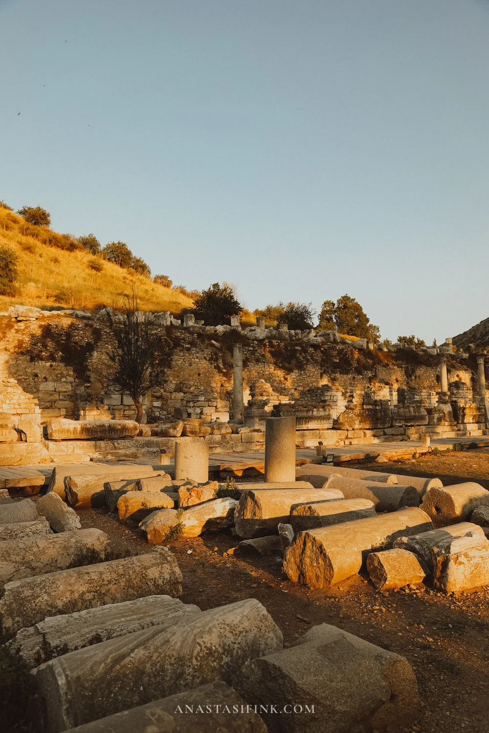 Fallen columns in rows in golden sunset light