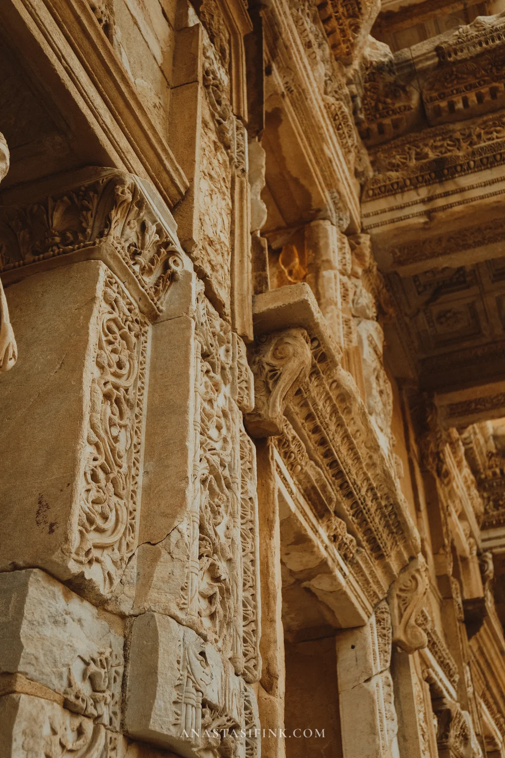 Carved decorative pilasters on the Library of Celsus facade