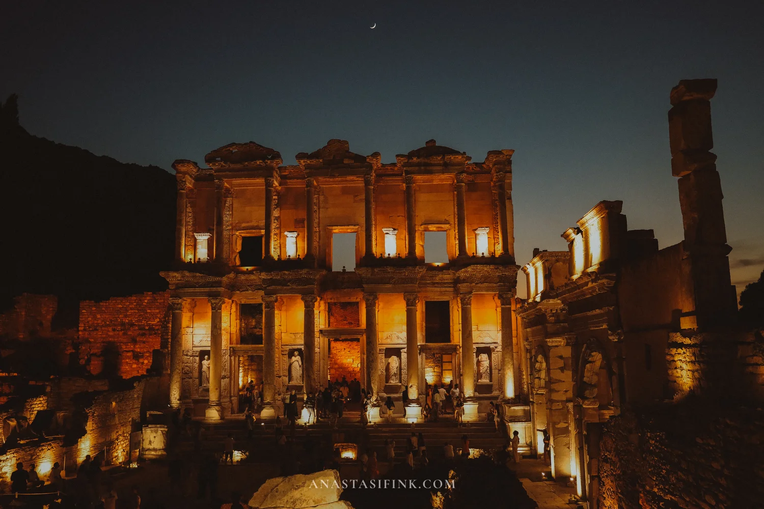 Library of Celsus with a crescent moon in the dark sky