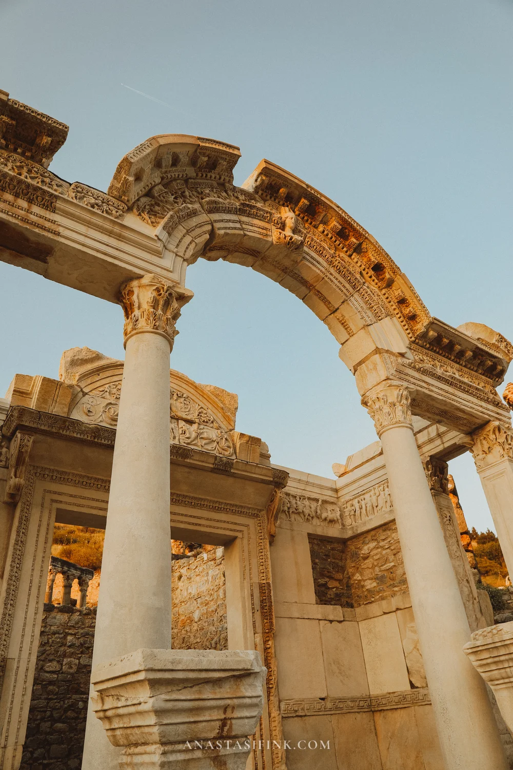 Temple of Hadrian, close-up of the ornate upper arch