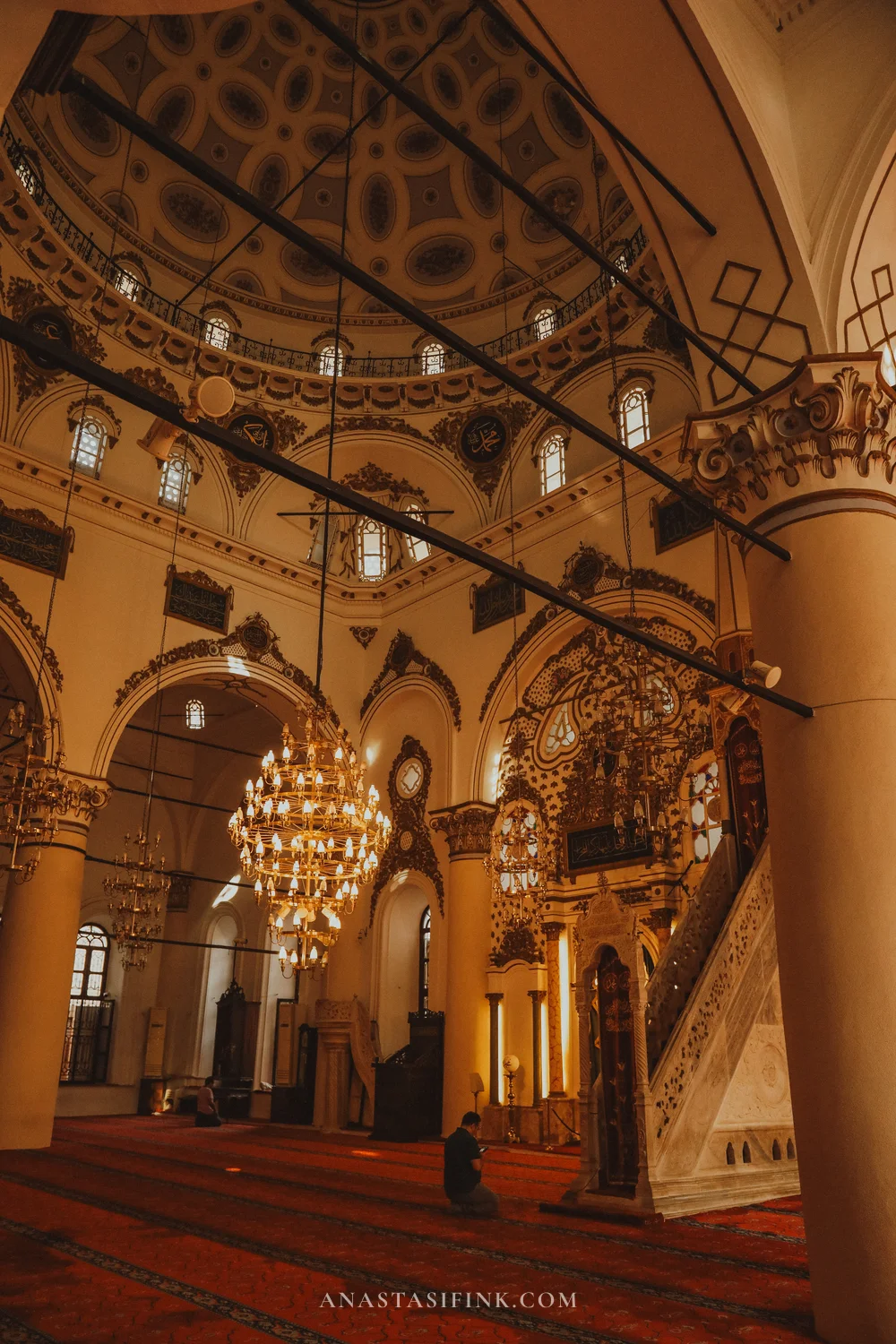 Prayer hall. Few people, quiet and peaceful atmosphere
