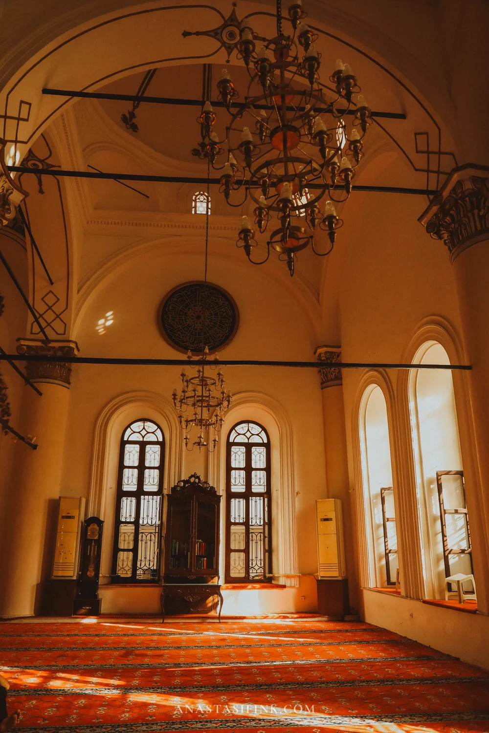 Sunlight through stained glass creates a warm atmosphere