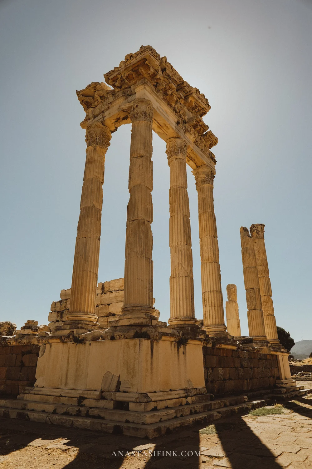Temple of Trajan at Pergamon Acropolis — columns against the sky, view from below