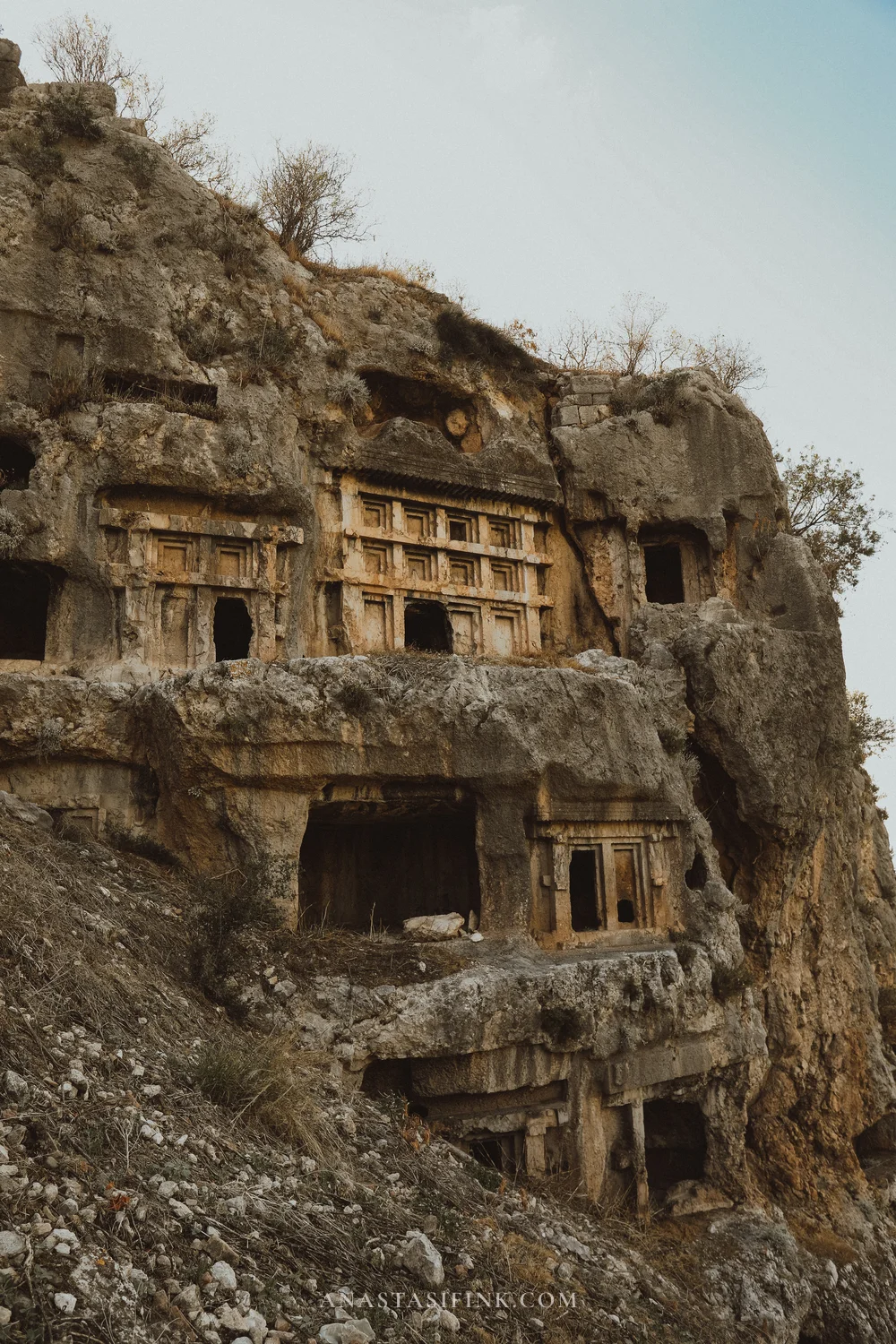 Bellerophon tomb cliff — vertical view of the carved rock face