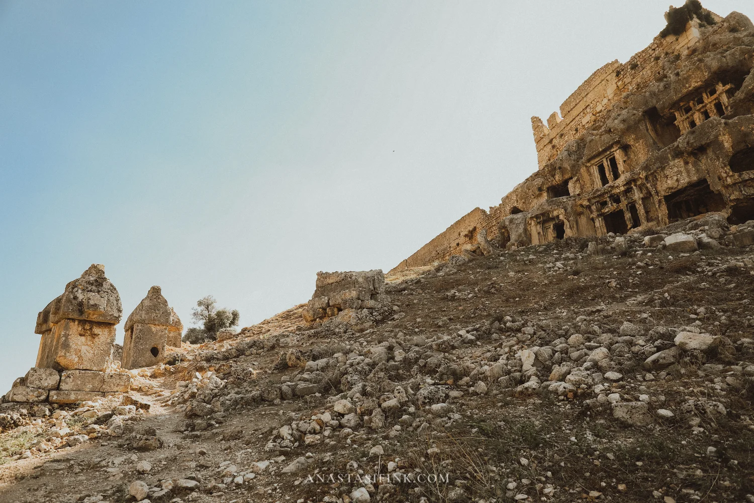 Lycian pillar tombs and sarcophagi below the acropolis