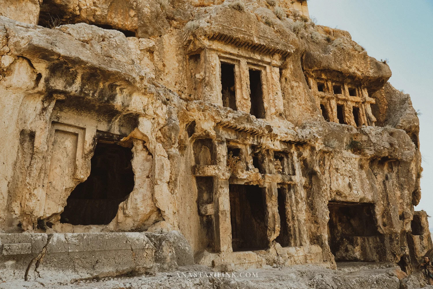 Wide-angle view of Lycian rock tombs at Tlos