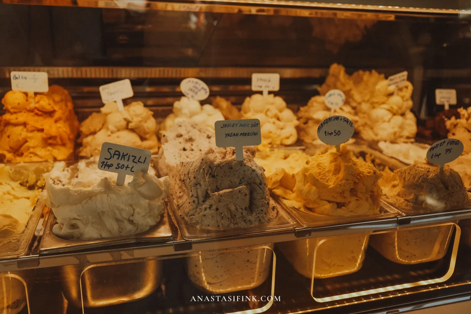 Necco gelateria display in Urla — ice cream with Turkish flavours, handwritten price tags