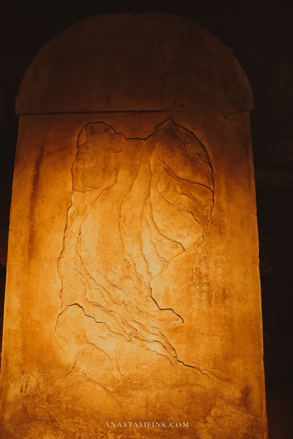 Stele with a carved mountain landscape