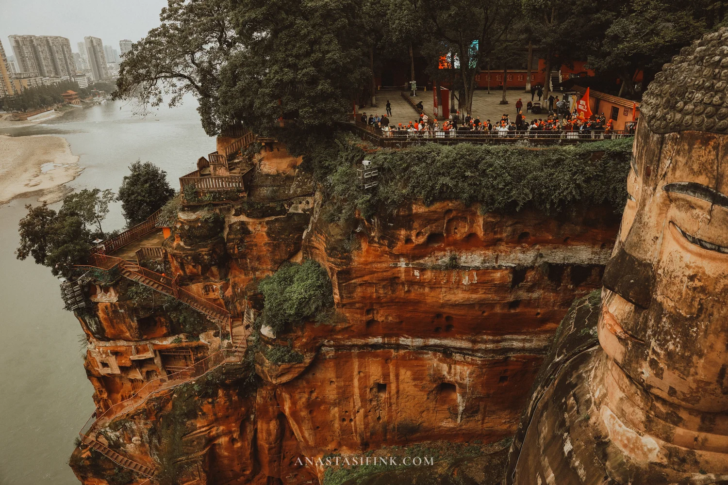 People on the upper platform by the Giant Buddha's head