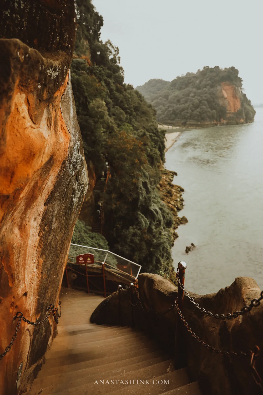 Steep Nine-Bend stairway with chains along the cliff