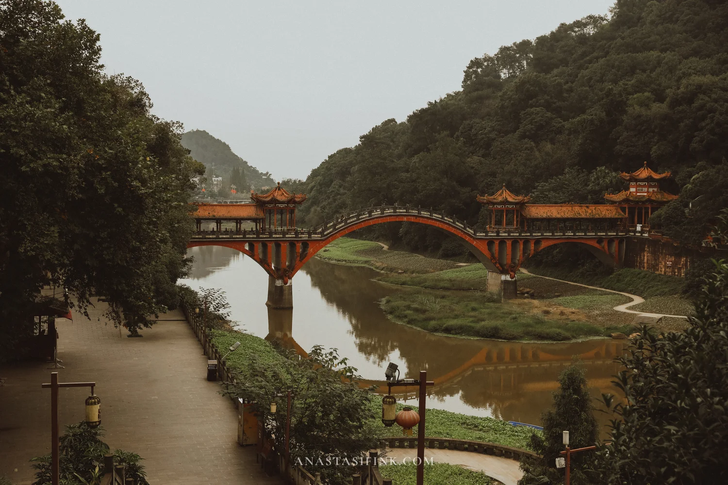 Arched Haoshang Bridge with pavilions over the river at Leshan