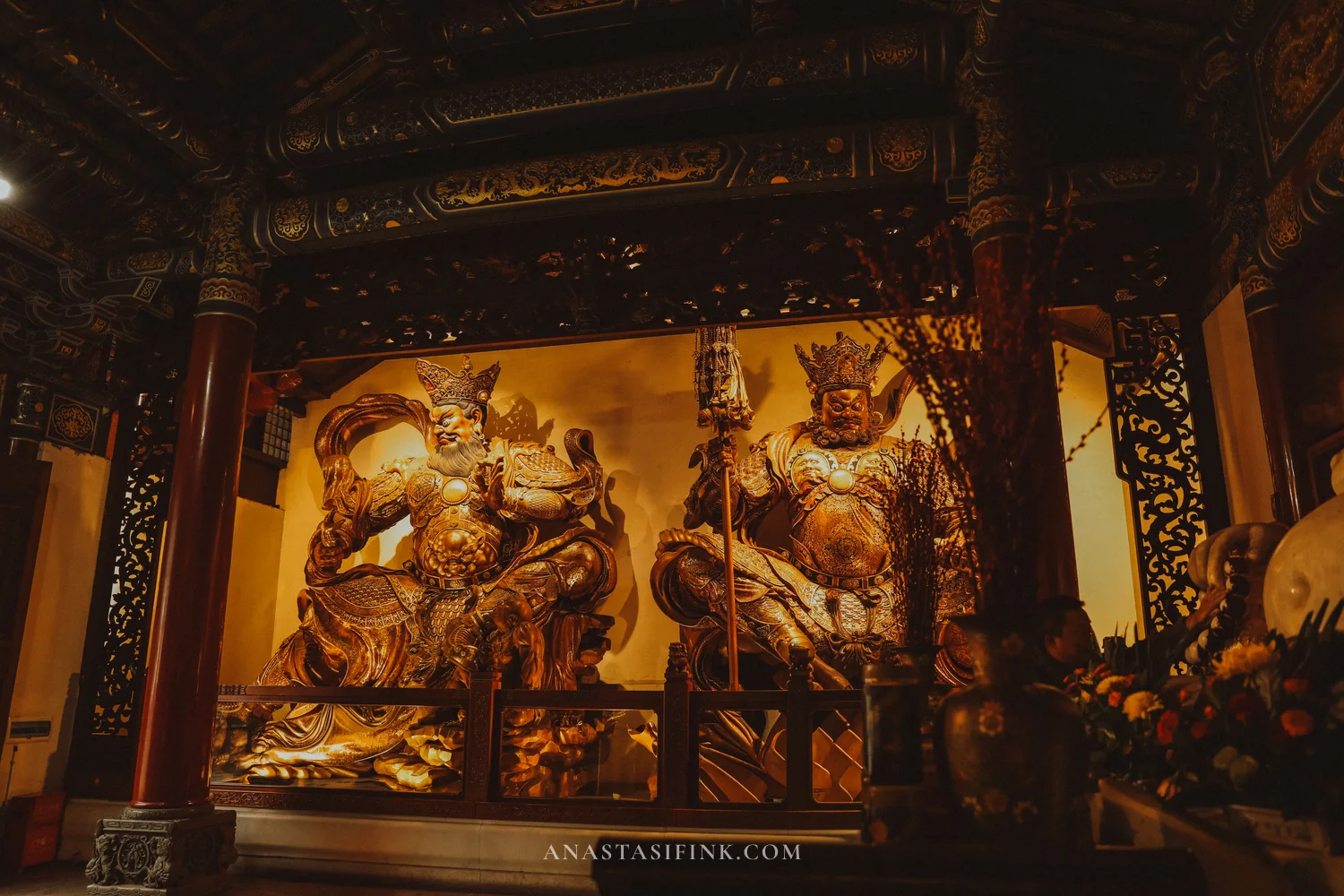 Two gilded Heavenly King guardian statues