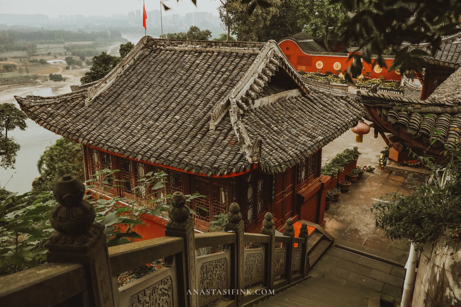 Roofs of Wuyou Temple from above with a river view