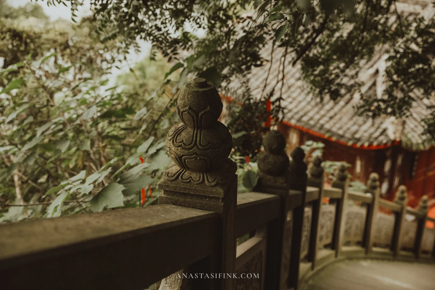 Detail of carved stone railing posts at Wuyou Temple