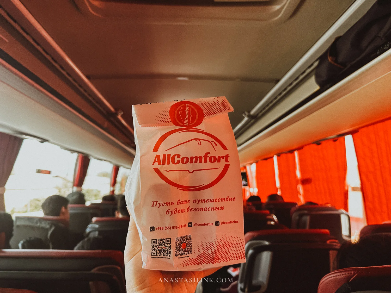 Interior of the Bukhara–Samarkand bus and the AllComfort carrier's branded bag