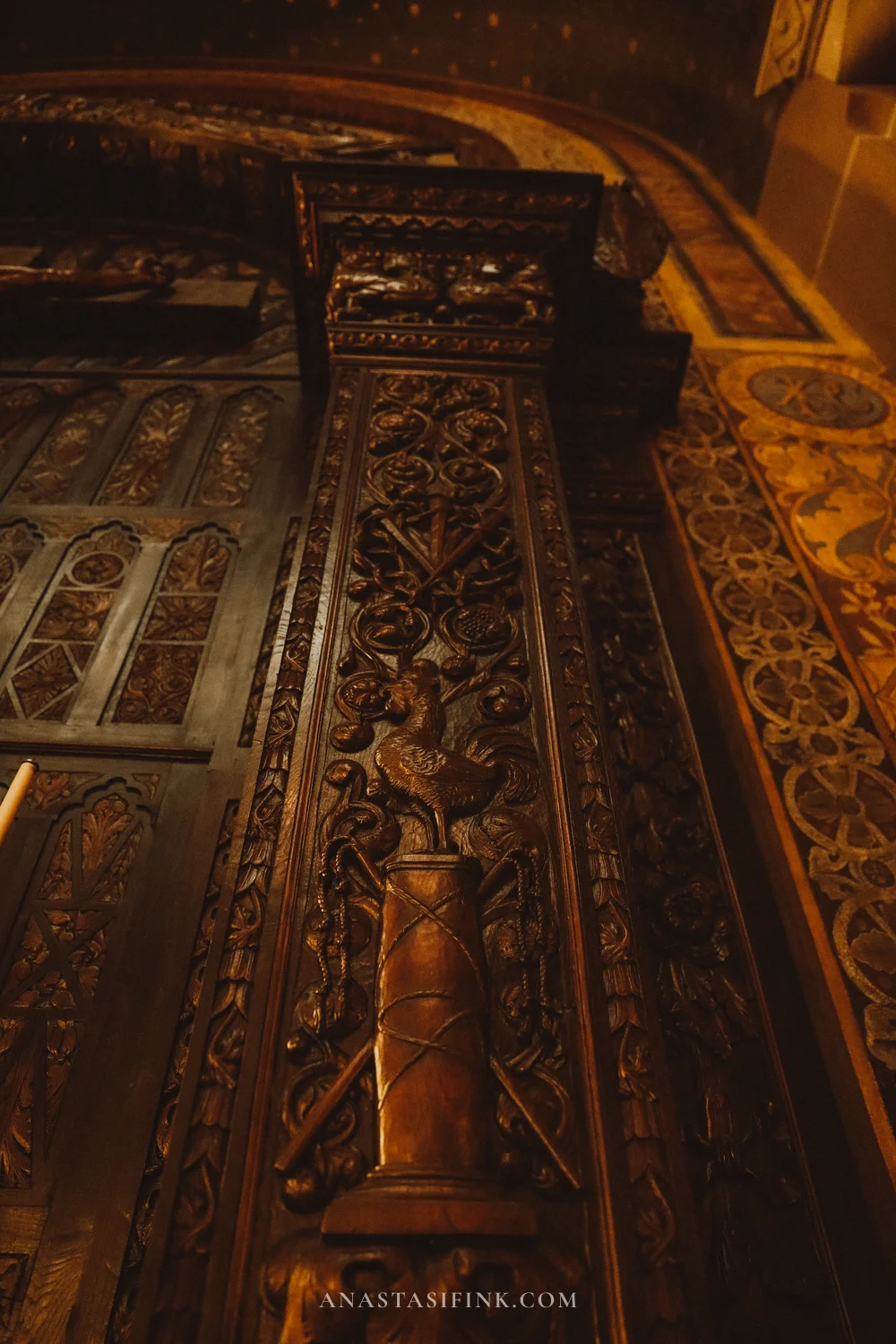 Carved wooden column with a rooster in the Sagrado Corazón basilica, Gijón