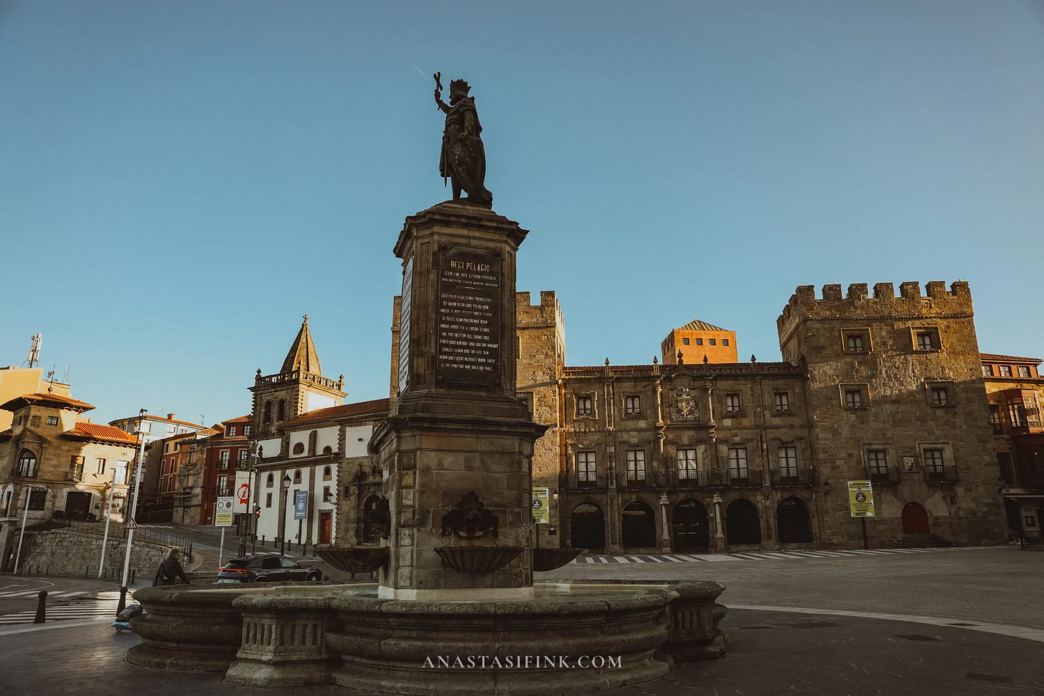 Monument to Pelayo with a fountain on Plaza del Marqués in Gijón