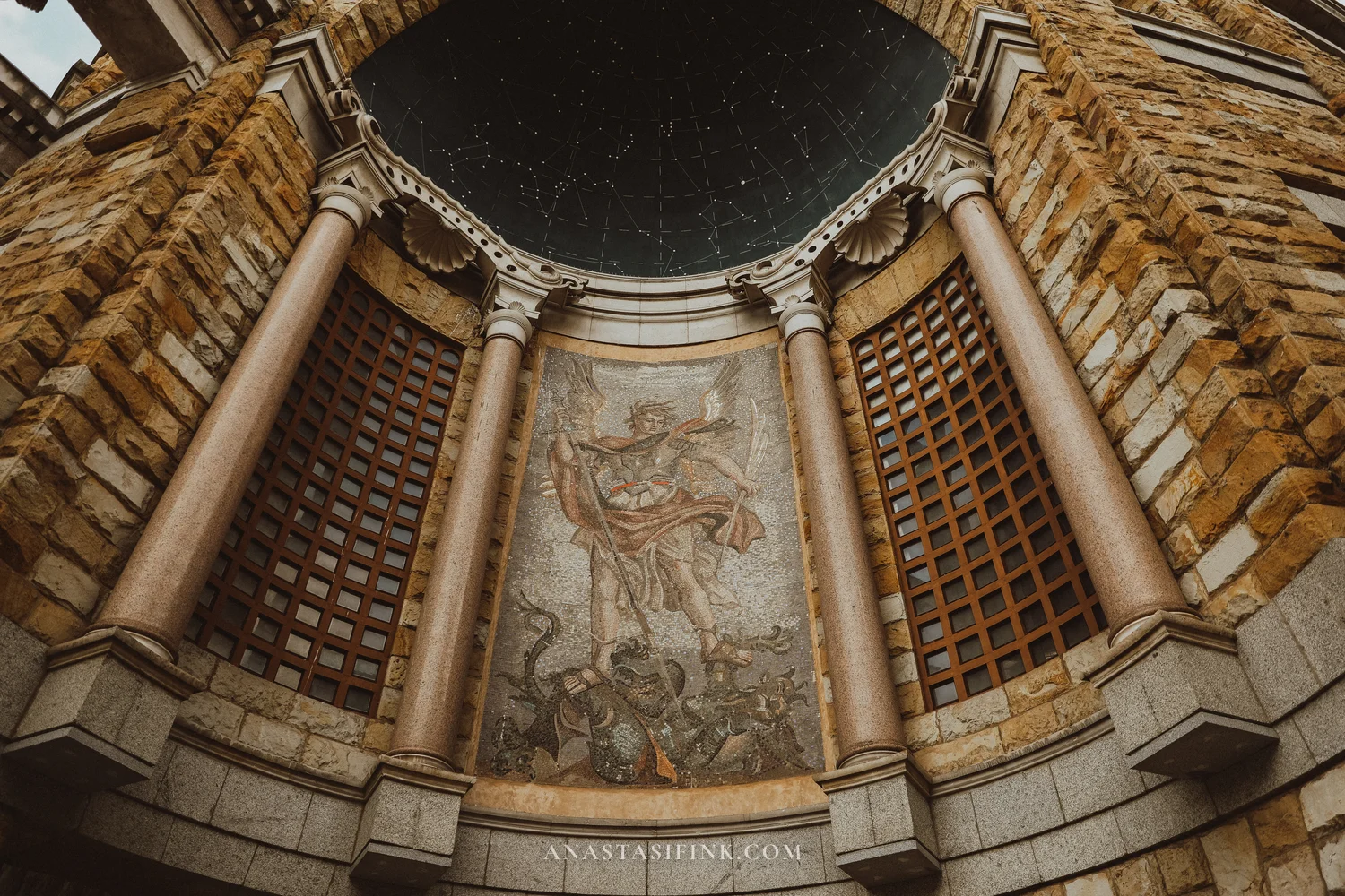 Mosaic of an archangel in the portico of the Universidad Laboral church in Gijón