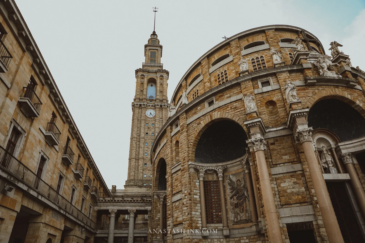 Tower and round church of Universidad Laboral in Gijón from below